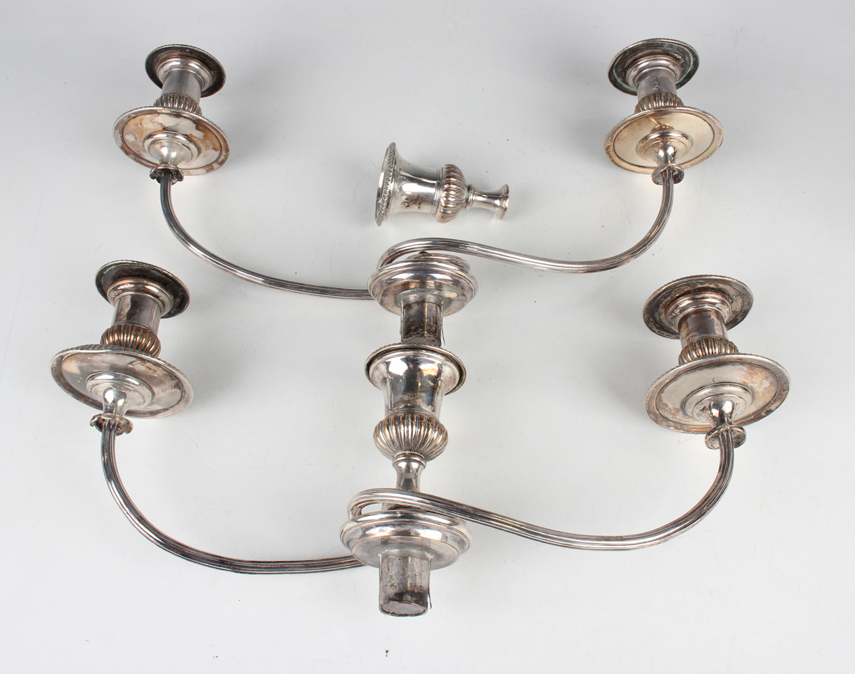 A pair of George III silver candlesticks, each sconce with reeded and foliate decoration above a - Image 2 of 4