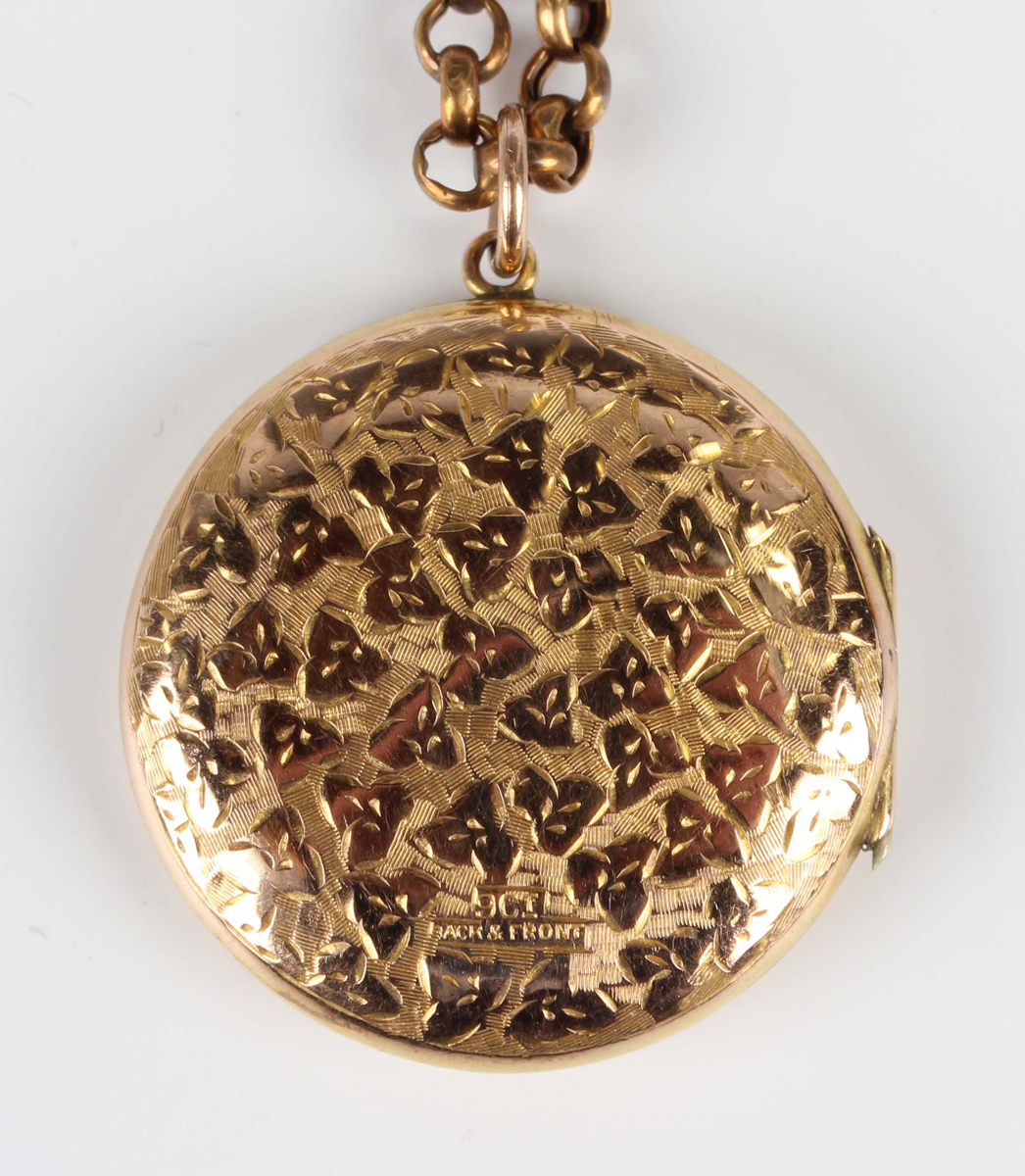 A gold back and front circular pendant locket with foliate engraved decoration, the front monogram - Image 3 of 4