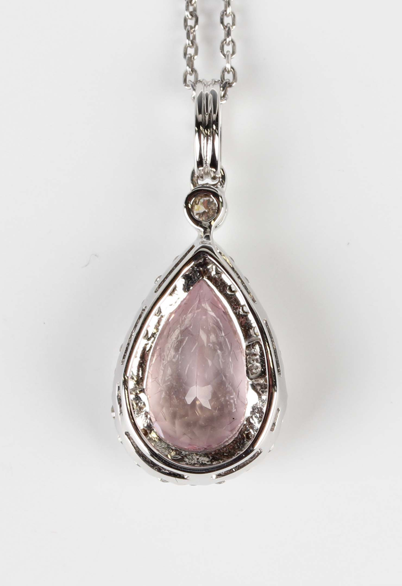 A white gold, morganite and diamond cluster pendant, claw set with a pear shaped morganite within - Image 2 of 3