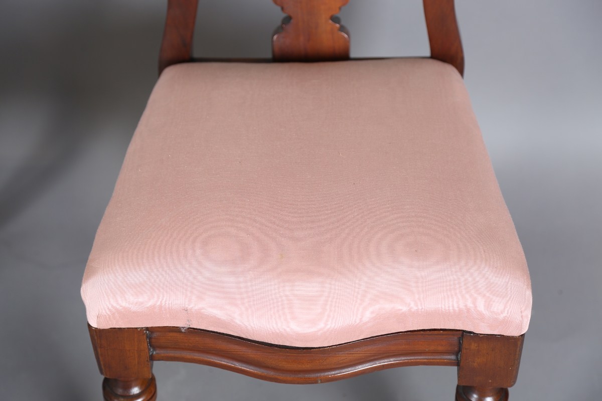 A set of four Victorian mahogany dining chairs, the shaped backs above upholstered drop-in seats, on - Image 8 of 9