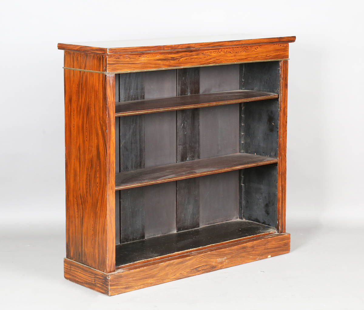 A 19th century simulated rosewood open bookcase, fitted with two brass inlaid shelves, height 100cm,