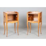 A pair of 20th century French oak bedside tables, each galleried top above an open shelf, height