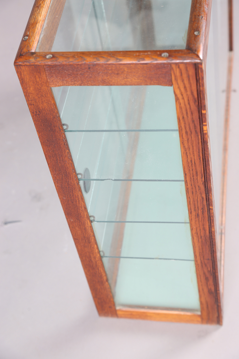 An early 20th century oak framed counter-top display cabinet, fitted with glass shelves and - Image 5 of 7