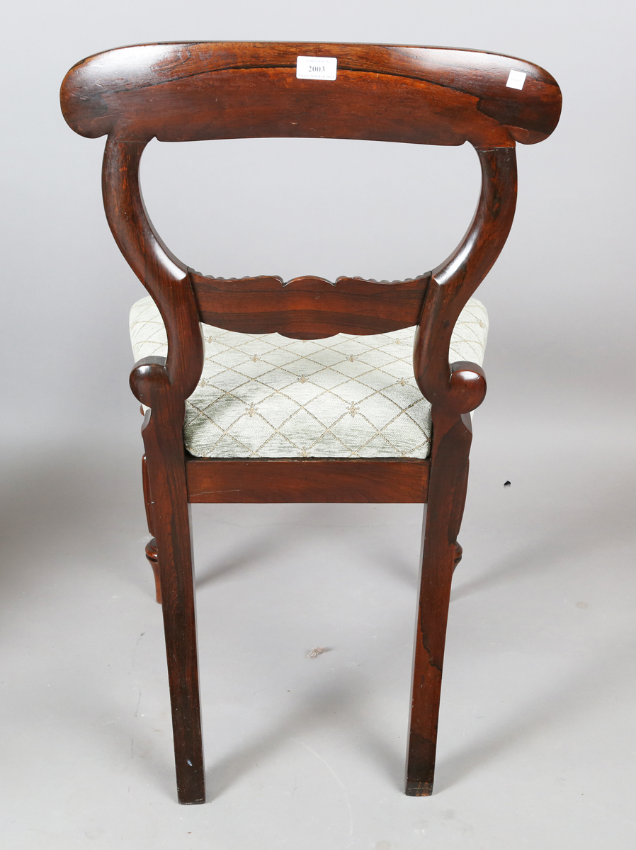 A pair of William IV rosewood dining chairs, in the manner of Gillows of Lancaster, the finely - Image 4 of 17