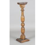An 18th century and later oak pedestal, height 101cm.Buyer’s Premium 29.4% (including VAT @ 20%)