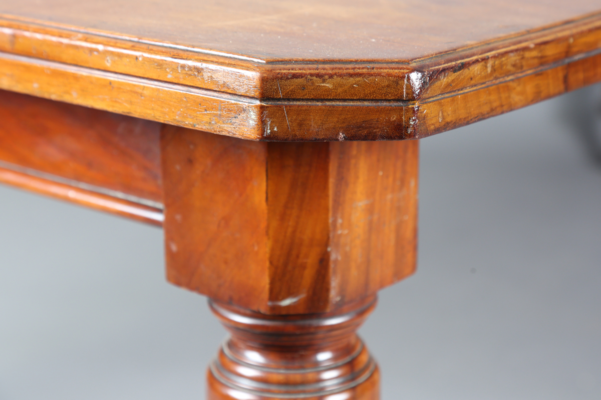 An Edwardian walnut extending dining table with two extra leaves, height 72cm, extended length - Image 4 of 8