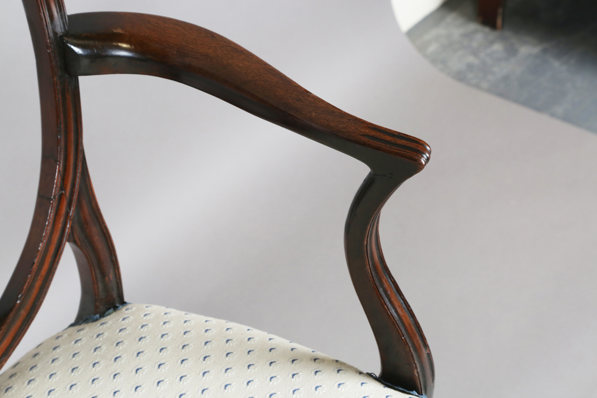 A George III mahogany shield back elbow chair, the seat covered in a patterned damask, height - Image 9 of 12