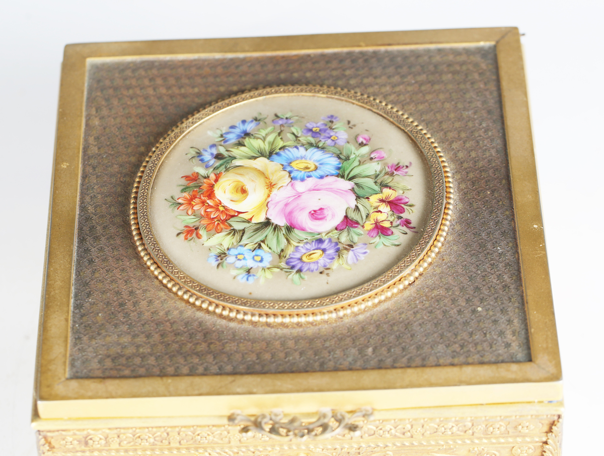 An early 20th century French gilt metal jewellery casket, the top inset with a floral painted - Image 9 of 9