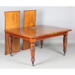 An Edwardian walnut extending dining table with two extra leaves, height 72cm, extended length