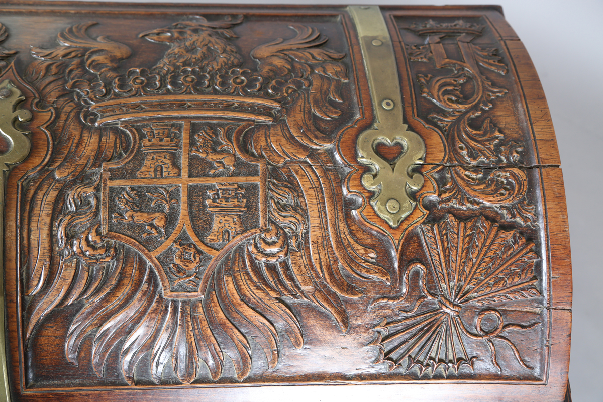 An 18th century French walnut domed trunk, finely carved with coats of arms, initials and further - Image 9 of 14