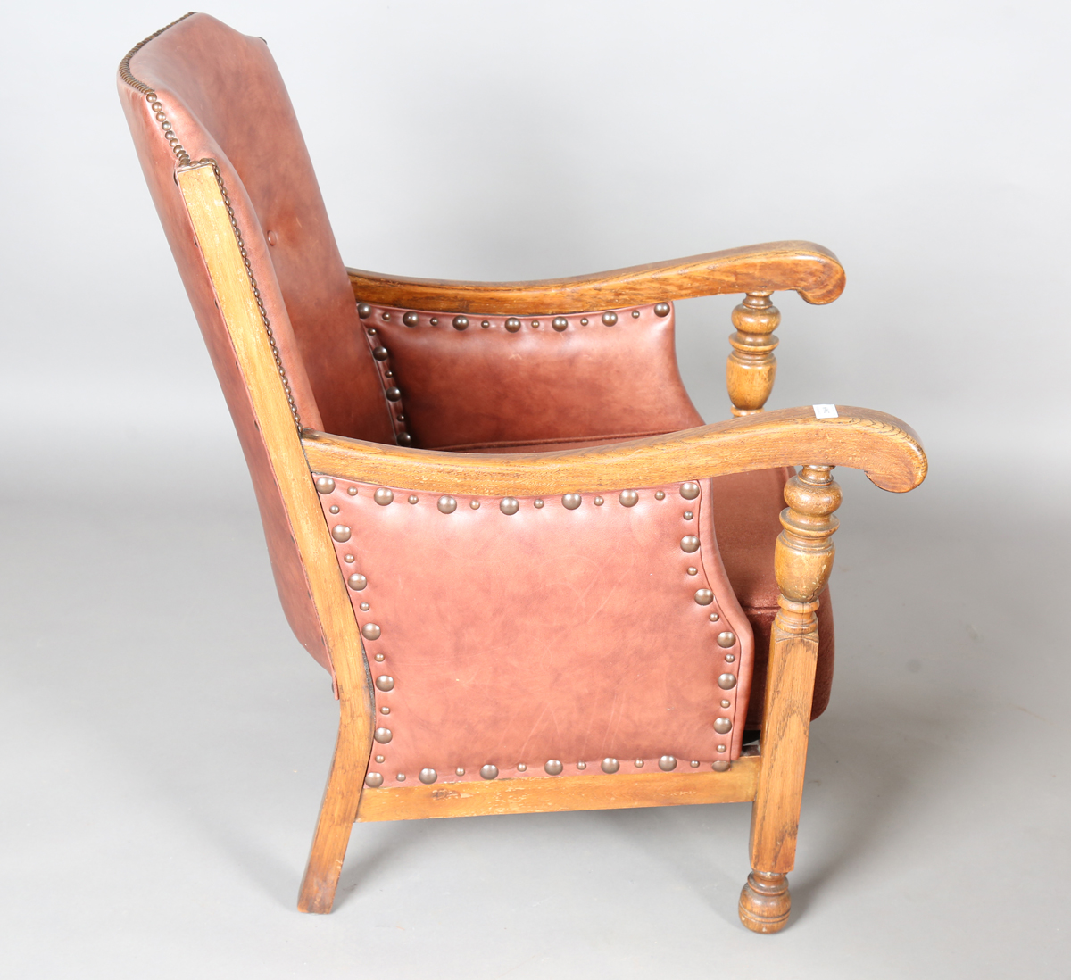 A pair of early/mid-20th century oak framed armchairs, upholstered in buttoned brown leatherette, - Image 7 of 24