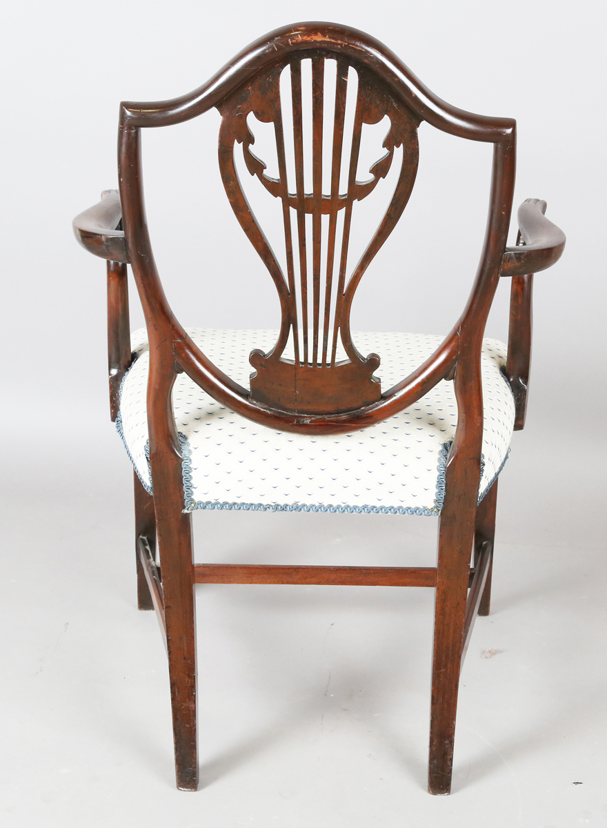 A George III mahogany shield back elbow chair, the seat covered in a patterned damask, height - Image 4 of 12