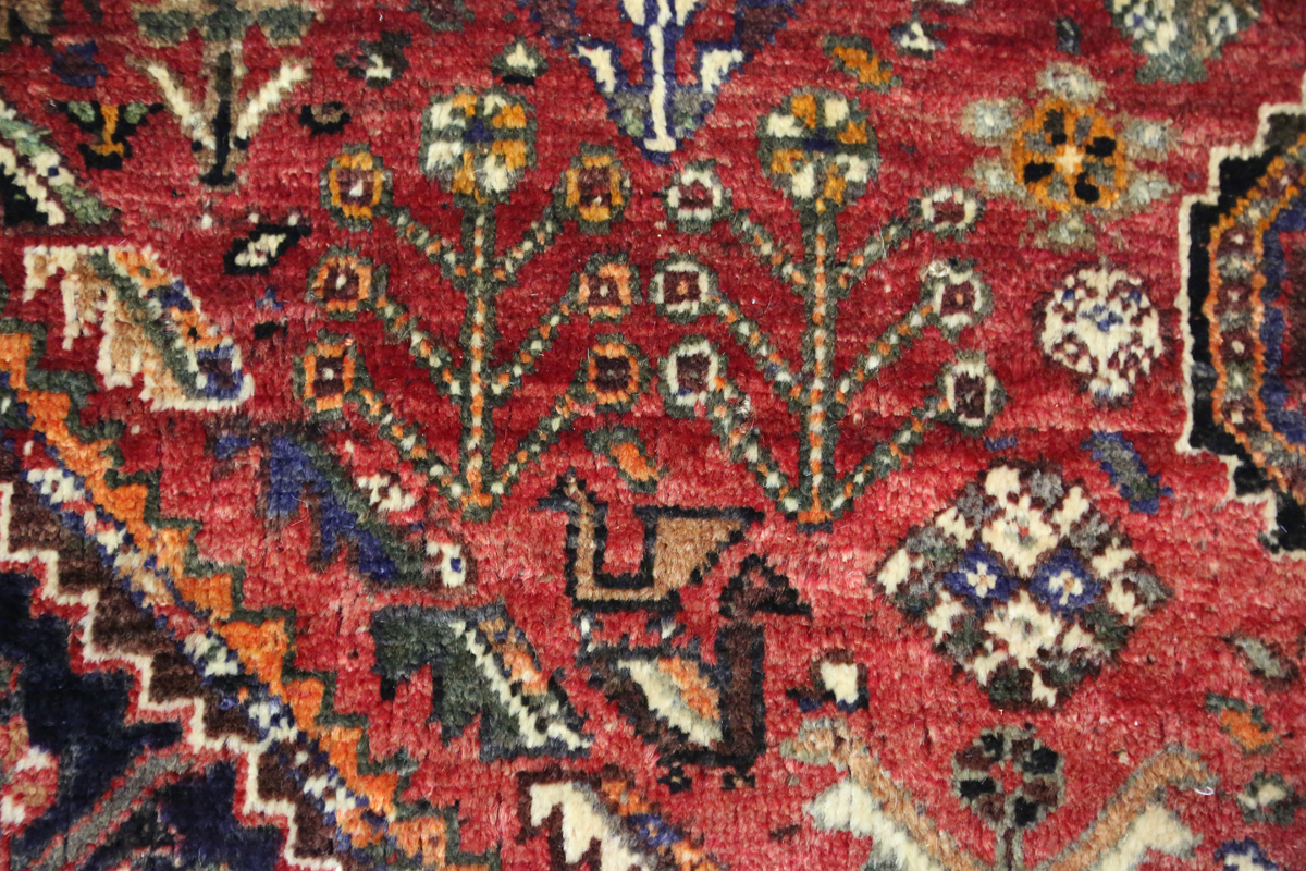 A Ghashghai rug, South-west Persia, late 20th century, the red field with three linked medallions, - Image 5 of 8