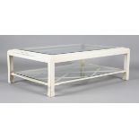 A modern painted coffee table, inset with a glass top and undertier, height 40cm, length 120cm,