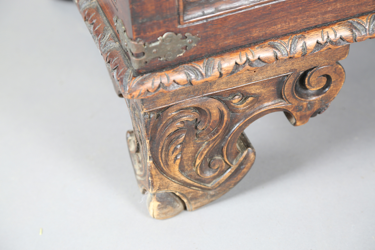 An 18th century French walnut domed trunk, finely carved with coats of arms, initials and further - Image 5 of 14