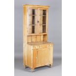 A Victorian provincial pine kitchen dresser, the glazed top above a concealed well, two drawers