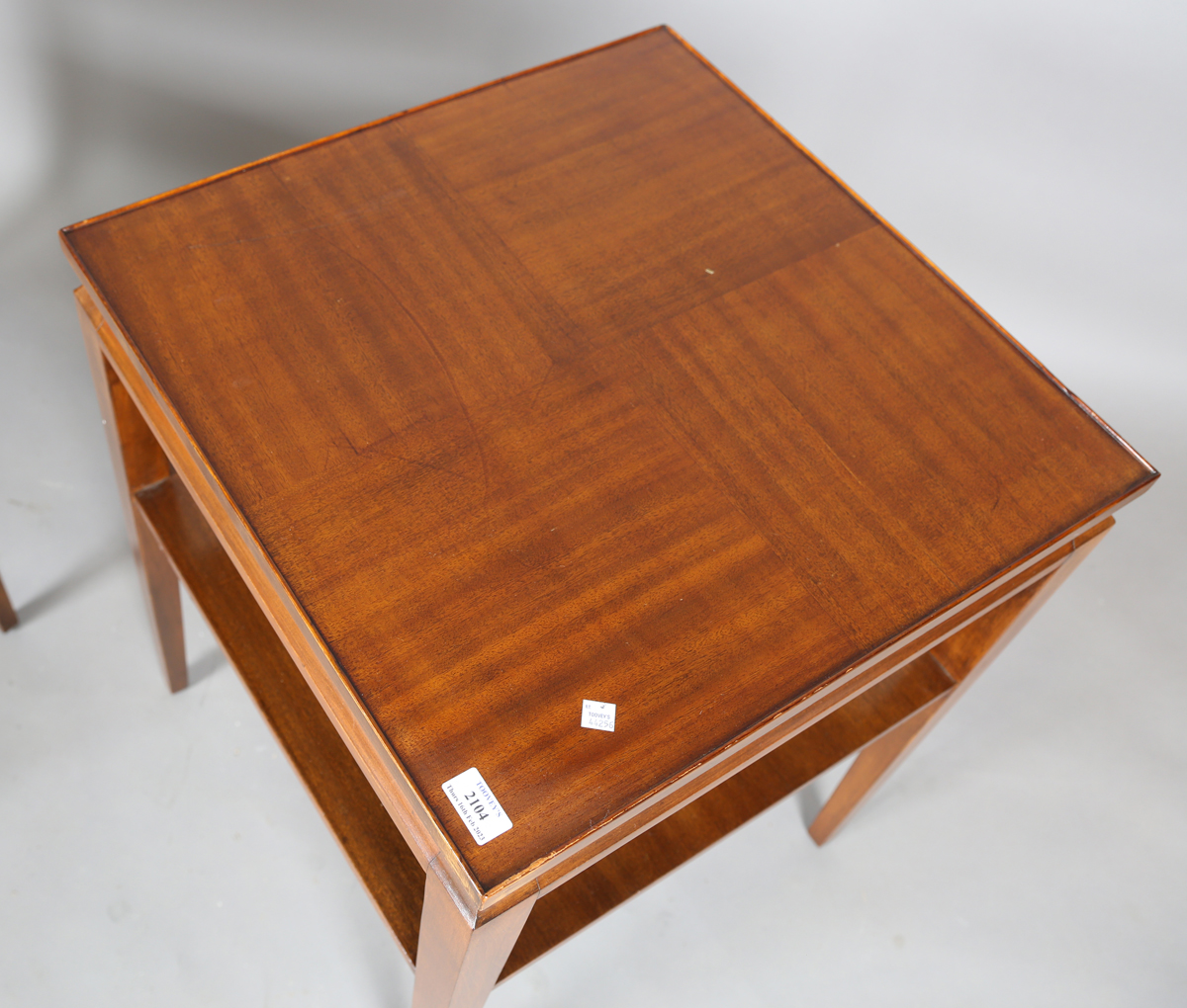 A pair of mid-20th century French mahogany lamp tables of retro design, the quarter-veneered tops - Image 8 of 8