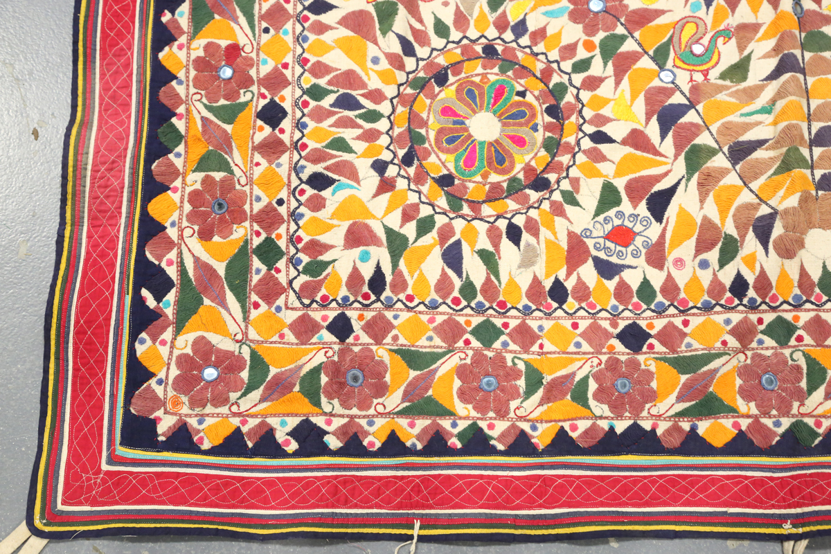 An Indian kutch needlework hanging, embroidered in polychrome threads and embellished with - Image 4 of 8