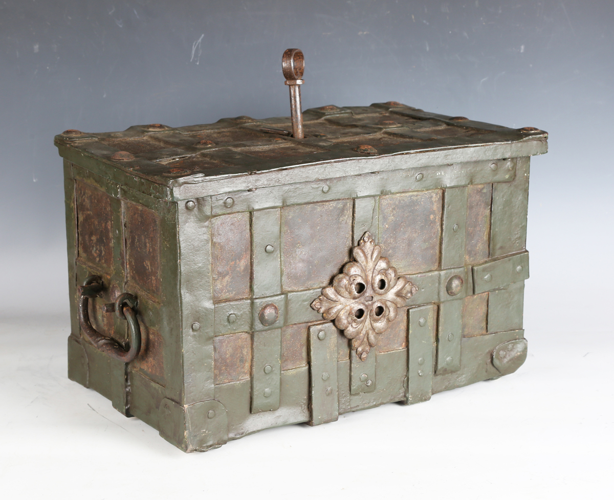 A 17th century steel Armada chest, the strapwork exterior fitted with ring handles, the interior