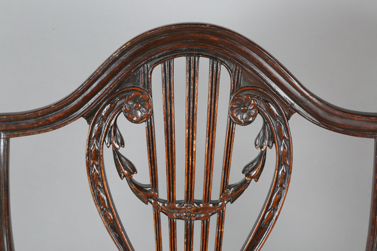 A George III mahogany shield back elbow chair, the seat covered in a patterned damask, height - Image 11 of 12