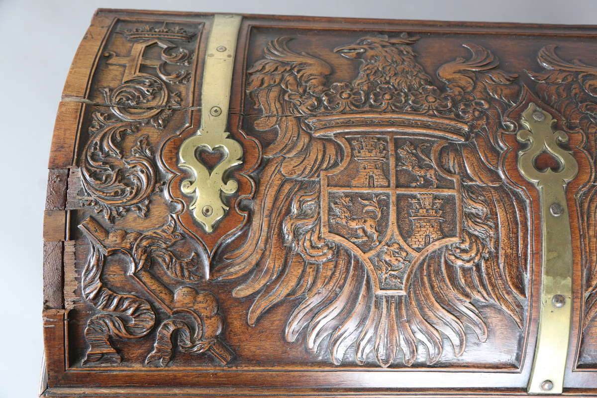 An 18th century French walnut domed trunk, finely carved with coats of arms, initials and further - Image 11 of 14