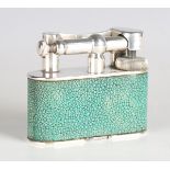 A Dunhill silver plated and shagreen table lighter, patent design No. 737418, width 8.5cm.Buyer’s