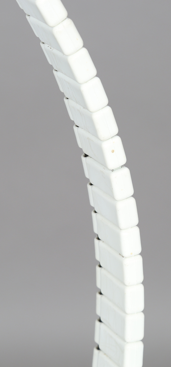 An Italian white plastic floor-standing lamp by Mod, with vertebrae style adjustable stem, - Image 6 of 8