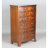 A 20th century George III style mahogany bowfront chest, fitted with six drawers, on splayed bracket