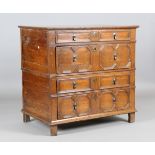 A William and Mary oak chest of four long drawers with applied geometric mouldings, height 92cm,