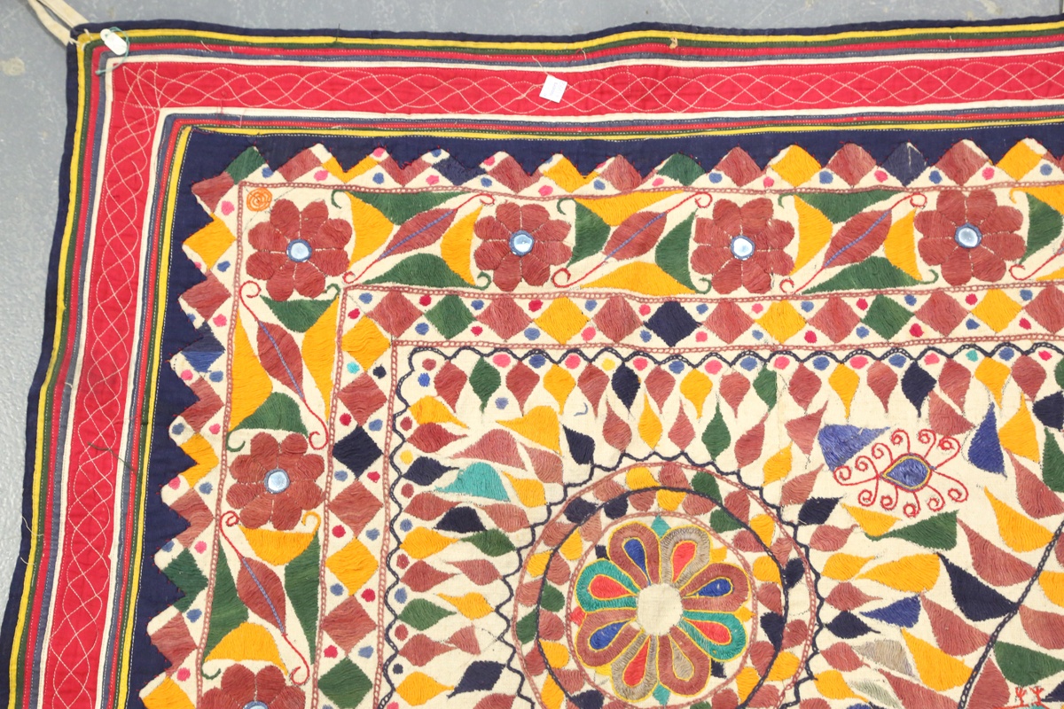 An Indian kutch needlework hanging, embroidered in polychrome threads and embellished with - Image 6 of 8