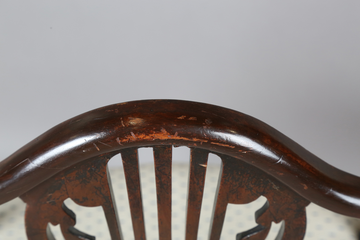 A George III mahogany shield back elbow chair, the seat covered in a patterned damask, height - Image 3 of 12