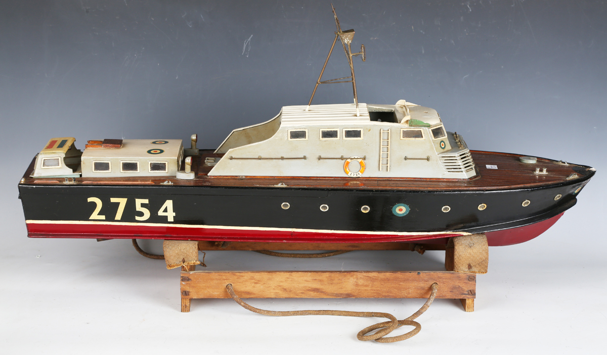 A 20th century wooden and plastic scale model of an R.A.F. motor launch boat, length 85cm.Buyer’s
