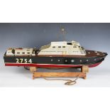 A 20th century wooden and plastic scale model of an R.A.F. motor launch boat, length 85cm.Buyer’s