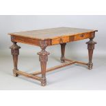 A late 18th century French walnut serving table, fitted with two frieze drawers, on carved