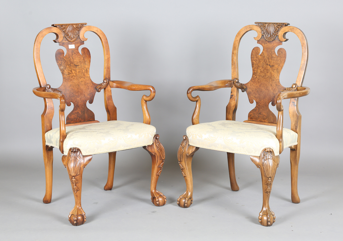 A late 20th century Queen Anne style walnut dining room suite, comprising a set of six chairs,