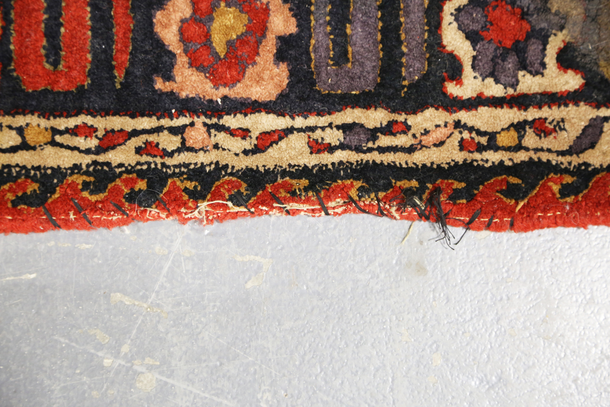 A Persian style rug, 20th century, the deep terracotta field with a column of palmettes, within a - Image 6 of 12