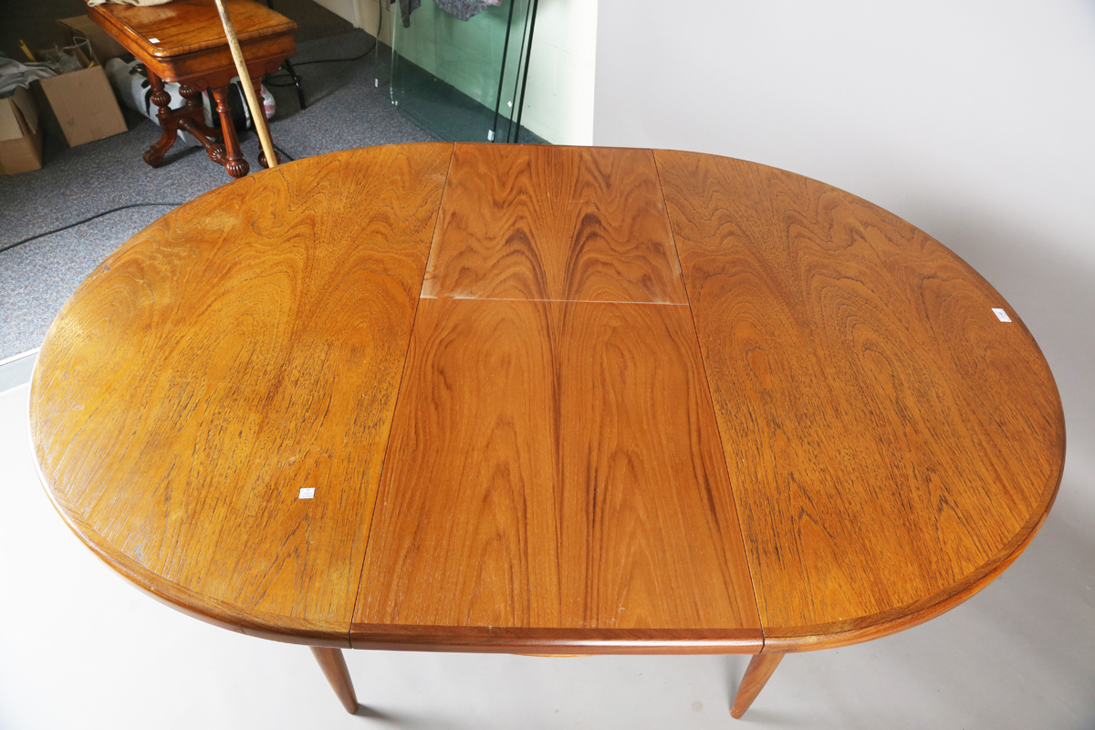 A mid-20th century G-plan teak extending dining table, the top with single extra leaf, height - Image 4 of 4