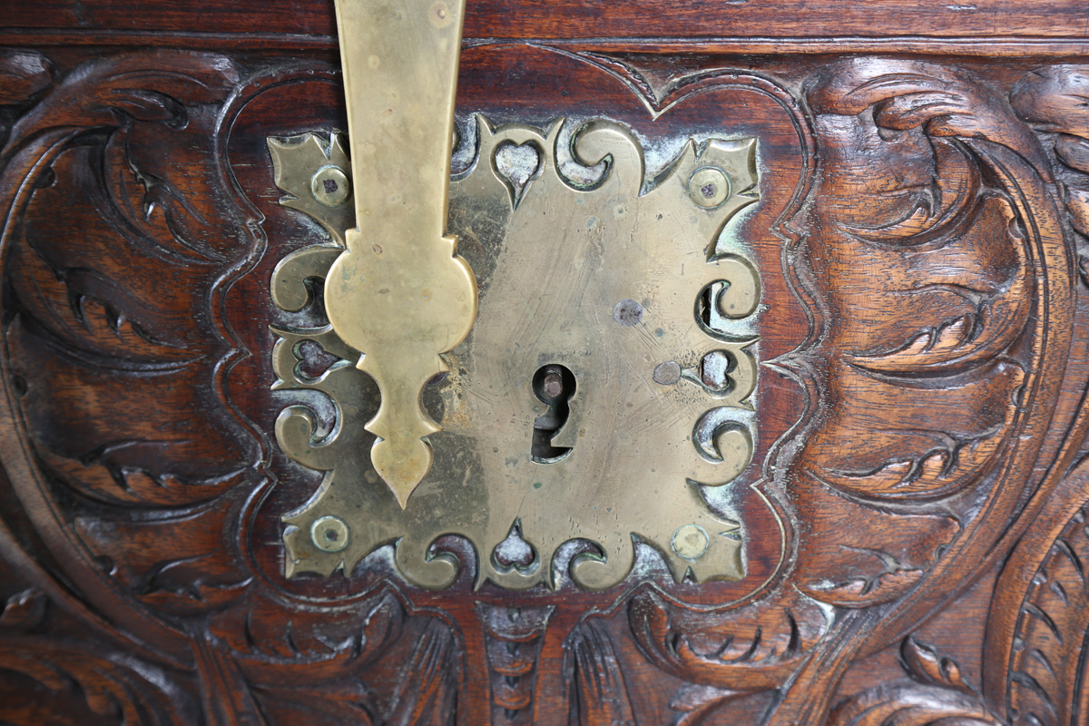 An 18th century French walnut domed trunk, finely carved with coats of arms, initials and further - Image 12 of 14