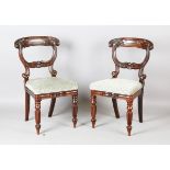 A pair of William IV rosewood dining chairs, in the manner of Gillows of Lancaster, the finely