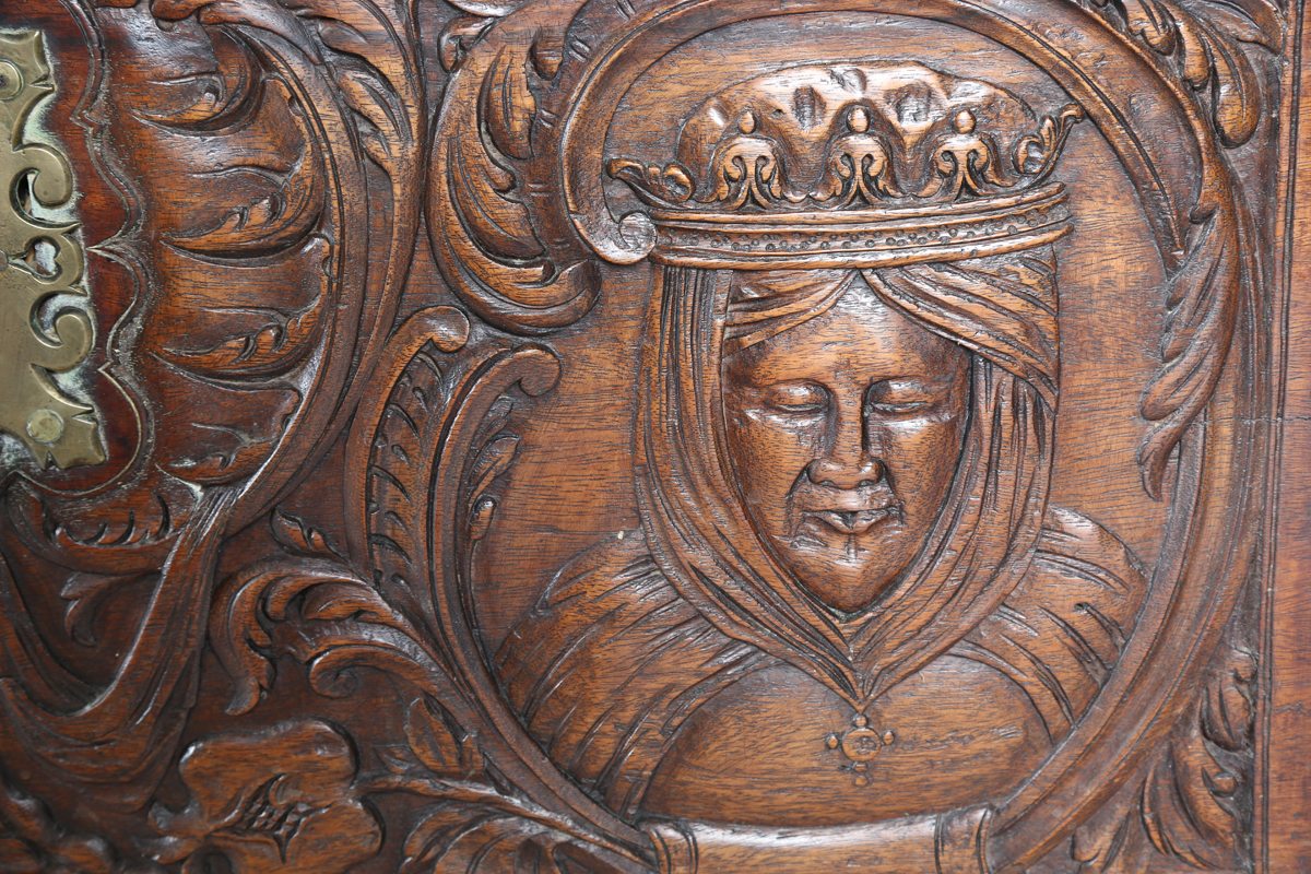 An 18th century French walnut domed trunk, finely carved with coats of arms, initials and further - Image 13 of 14