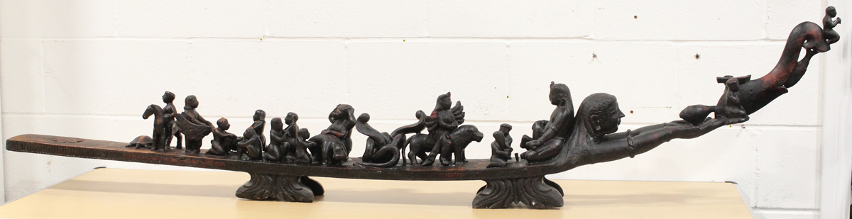 A large late 20th century stained hardwood carving, probably Bangladeshi or Indian, carved and