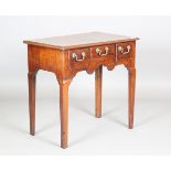 A George III mahogany side table, fitted with three oak-lined drawers, height 71cm, width 74cm,