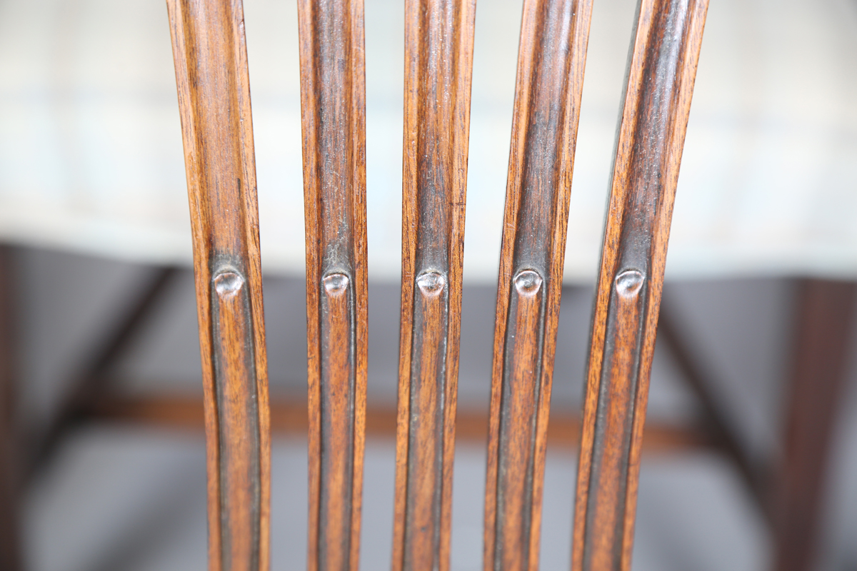 A set of four George III mahogany dining chairs with pierced splat backs and overstuffed seats, - Image 11 of 12