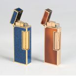 A Dunhill gilt metal and dark blue enamelled gas lighter, detailed 'Made in Switzerland', and a