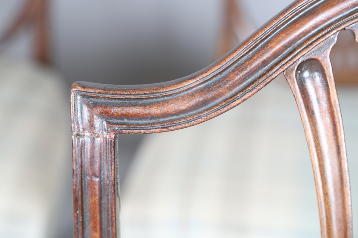 A set of four George III mahogany dining chairs with pierced splat backs and overstuffed seats, - Image 10 of 12