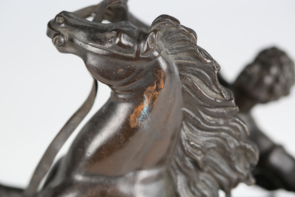 After Guillaume Coustou - a 19th century brown patinated cast bronze model of a Marly horse and - Image 4 of 12