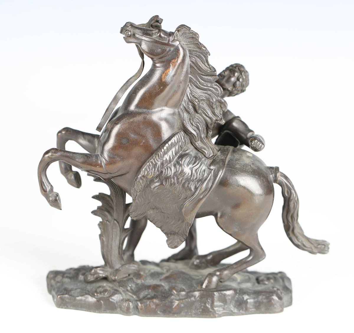 After Guillaume Coustou - a 19th century brown patinated cast bronze model of a Marly horse and - Image 5 of 12