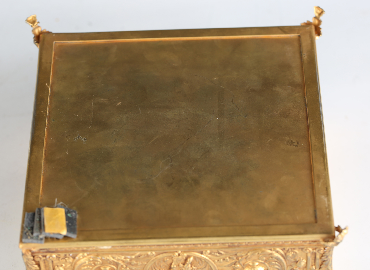 An early 20th century French gilt metal jewellery casket, the top inset with a floral painted - Image 3 of 9