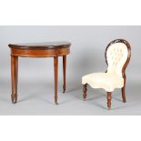 An Edwardian mahogany and satinwood crossbanded demi-lune fold-over card table, height 74cm, width