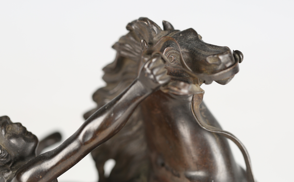 After Guillaume Coustou - a 19th century brown patinated cast bronze model of a Marly horse and - Image 12 of 12